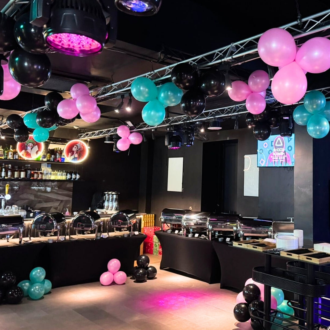Party room with balloons and DJ equipment