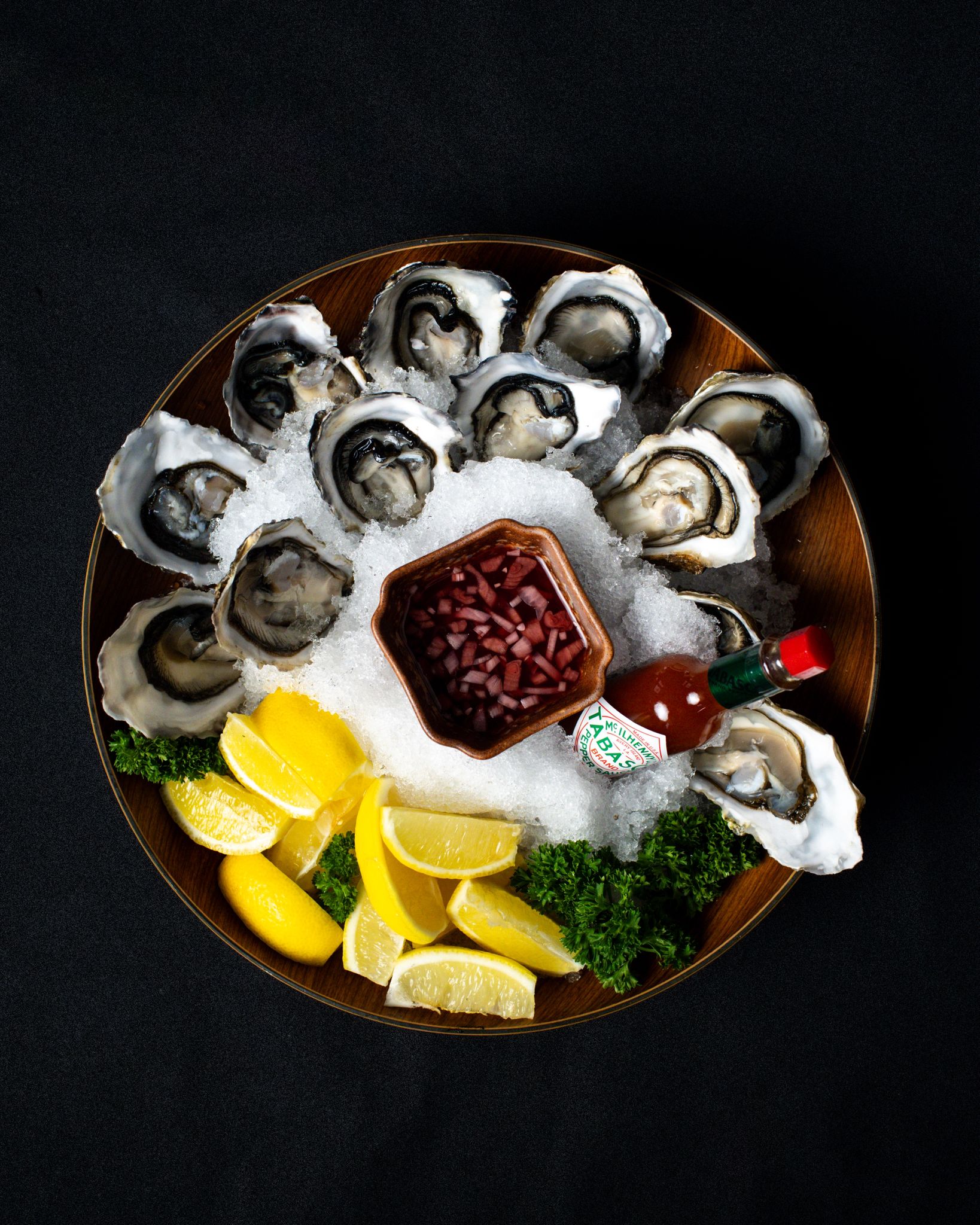 Oysters Plate in a bar at Clarke Quay.